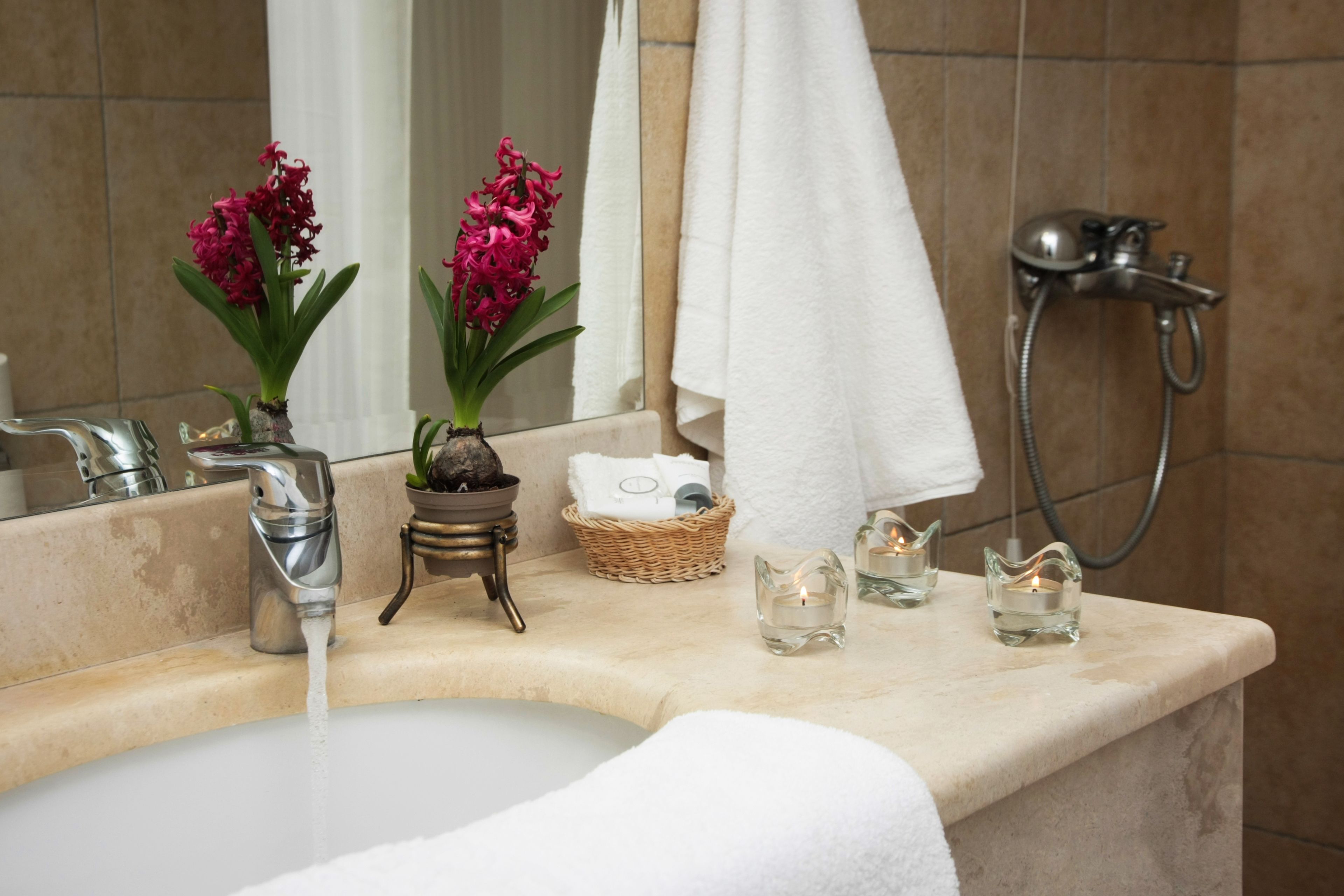 hair dryer, bathrobes, slippers, towels