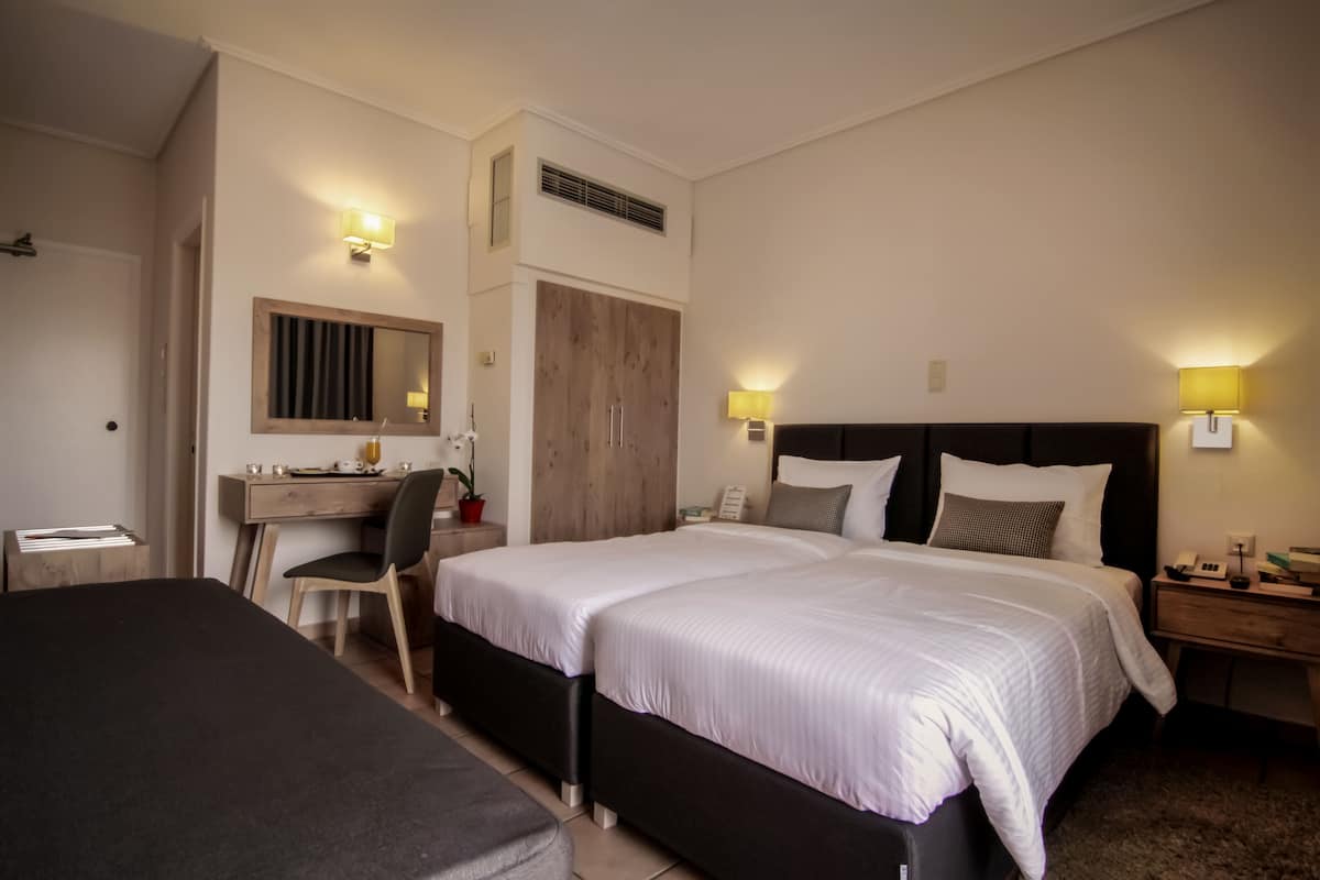 Triple Room, Balcony | 1 bedroom, in-room safe, desk, iron/ironing board