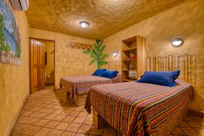 Village Room - 1 Queen, 1 Single | Soundproofing, free WiFi, bed sheets - El Sano Banano Beachside Hotel (Cóbano)