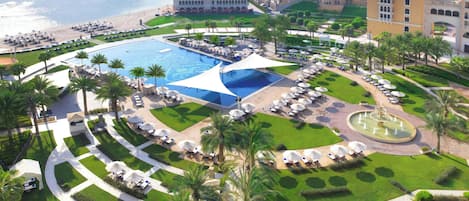 2 outdoor pools, open 7:00 AM to 8:00 PM, free cabanas, pool umbrellas