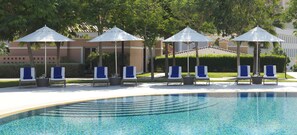 2 outdoor pools, open 7:00 AM to 8:00 PM, free cabanas, pool umbrellas