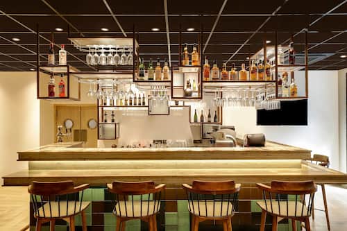 Sports bar, poolside views, open daily