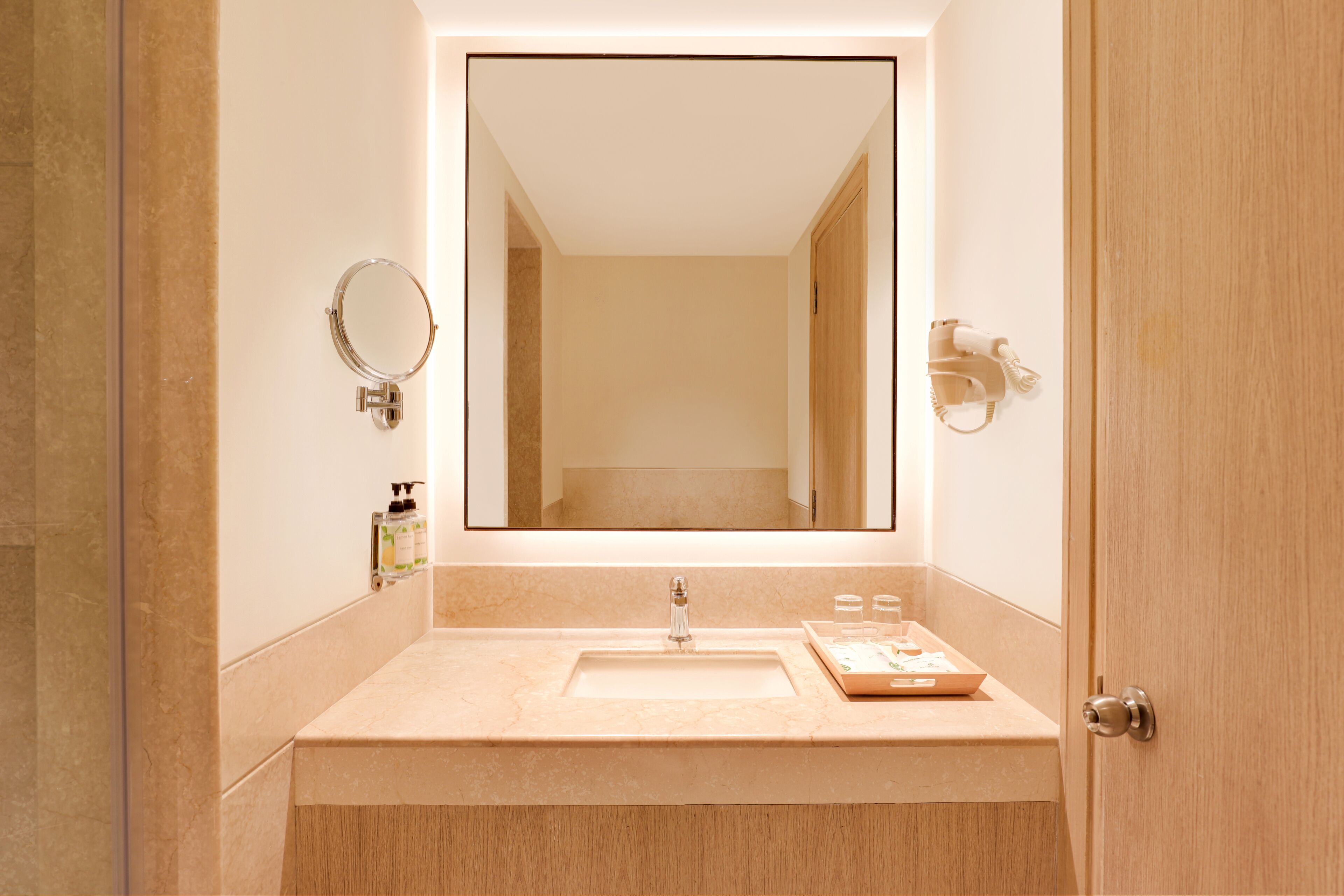 deluxe king room | bathroom | rainfall showerhead, free toiletries, hair dryer, bathrobes