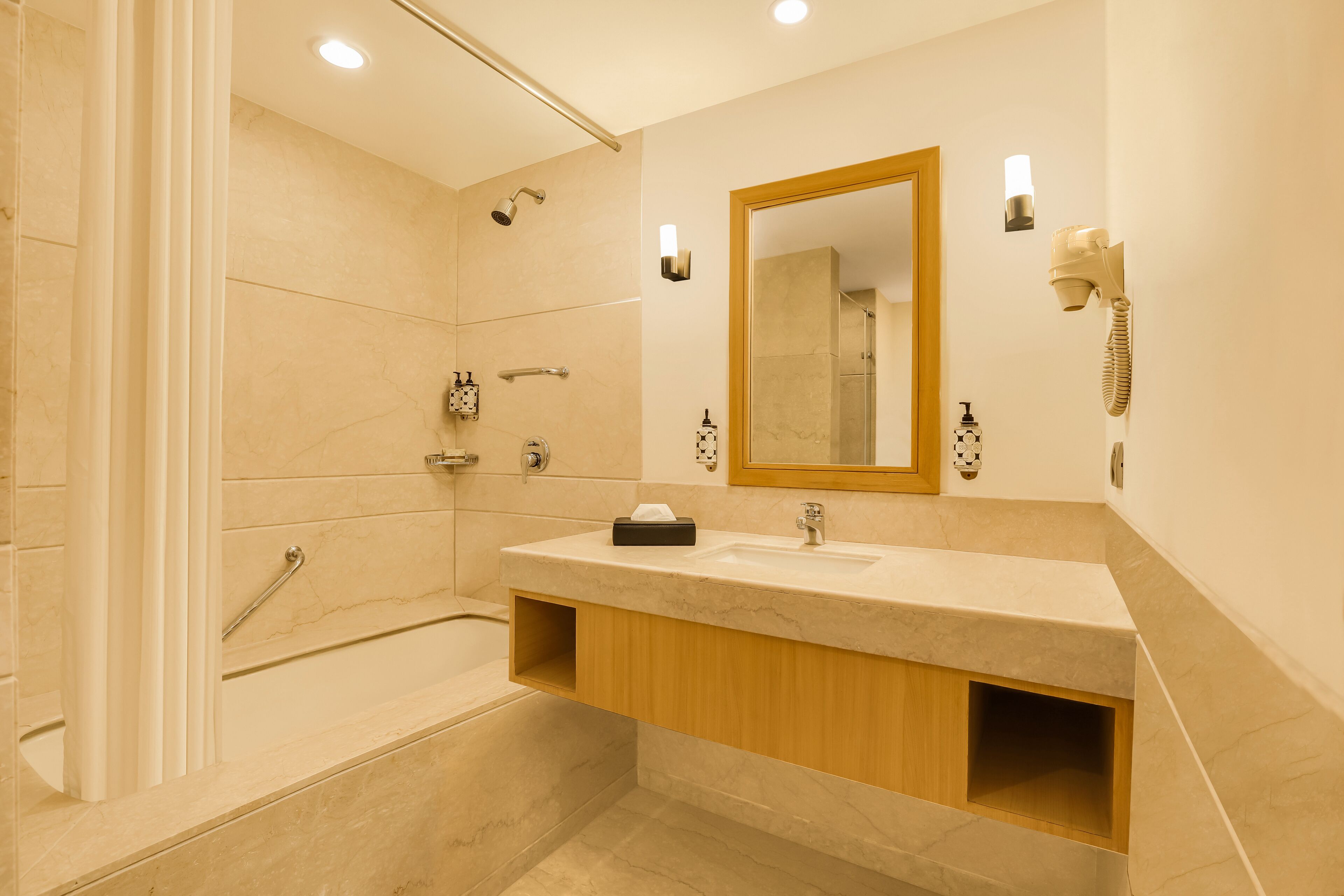 executive suite king | bathroom | rainfall showerhead, free toiletries, hair dryer, bathrobes