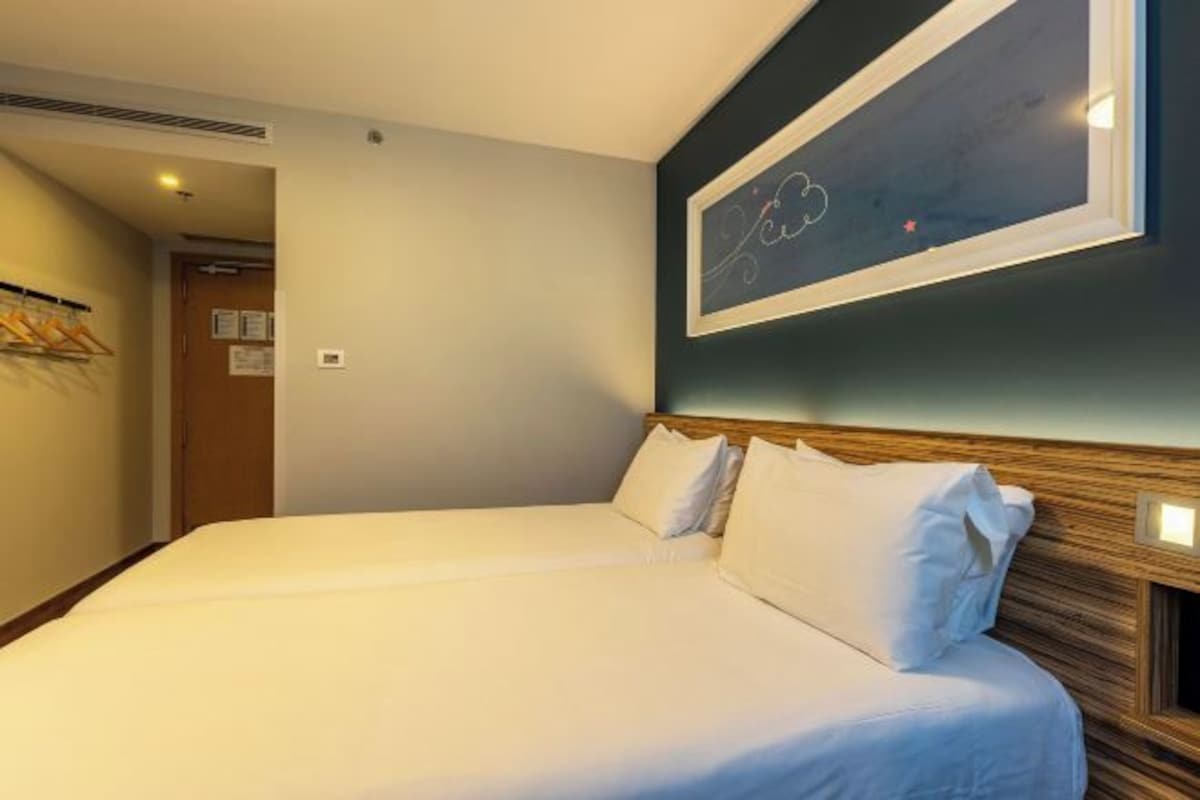 Premium bedding, down duvets, pillow-top beds, minibar