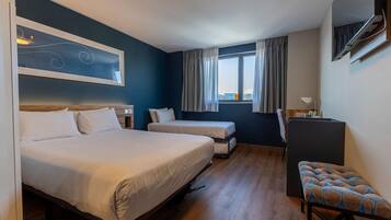 Luxe beddengoed, donzen dekbedden, pillowtop-bedden, een minibar