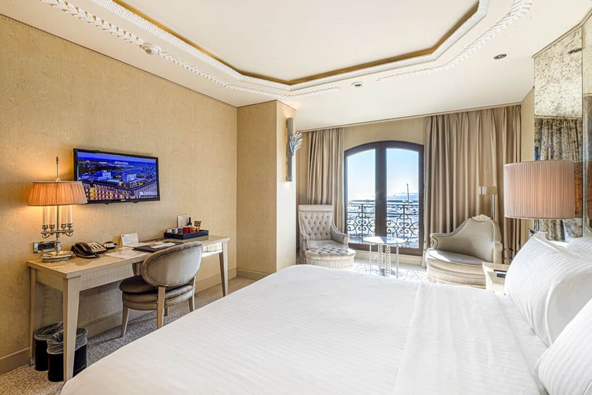 Habitación Deluxe, 1 cama King size, vista al mar | Ropa de cama de alta calidad, camas con pillow-top y minibar