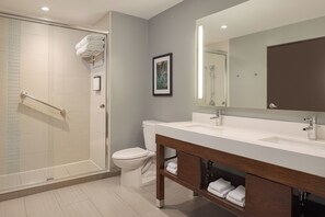 Designer toiletries, hair dryer, towels