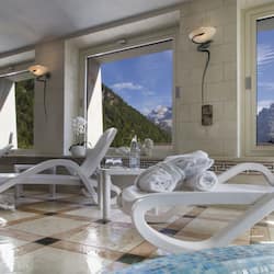 Indoor pool, open 8:00 AM to 8:00 PM, pool loungers
