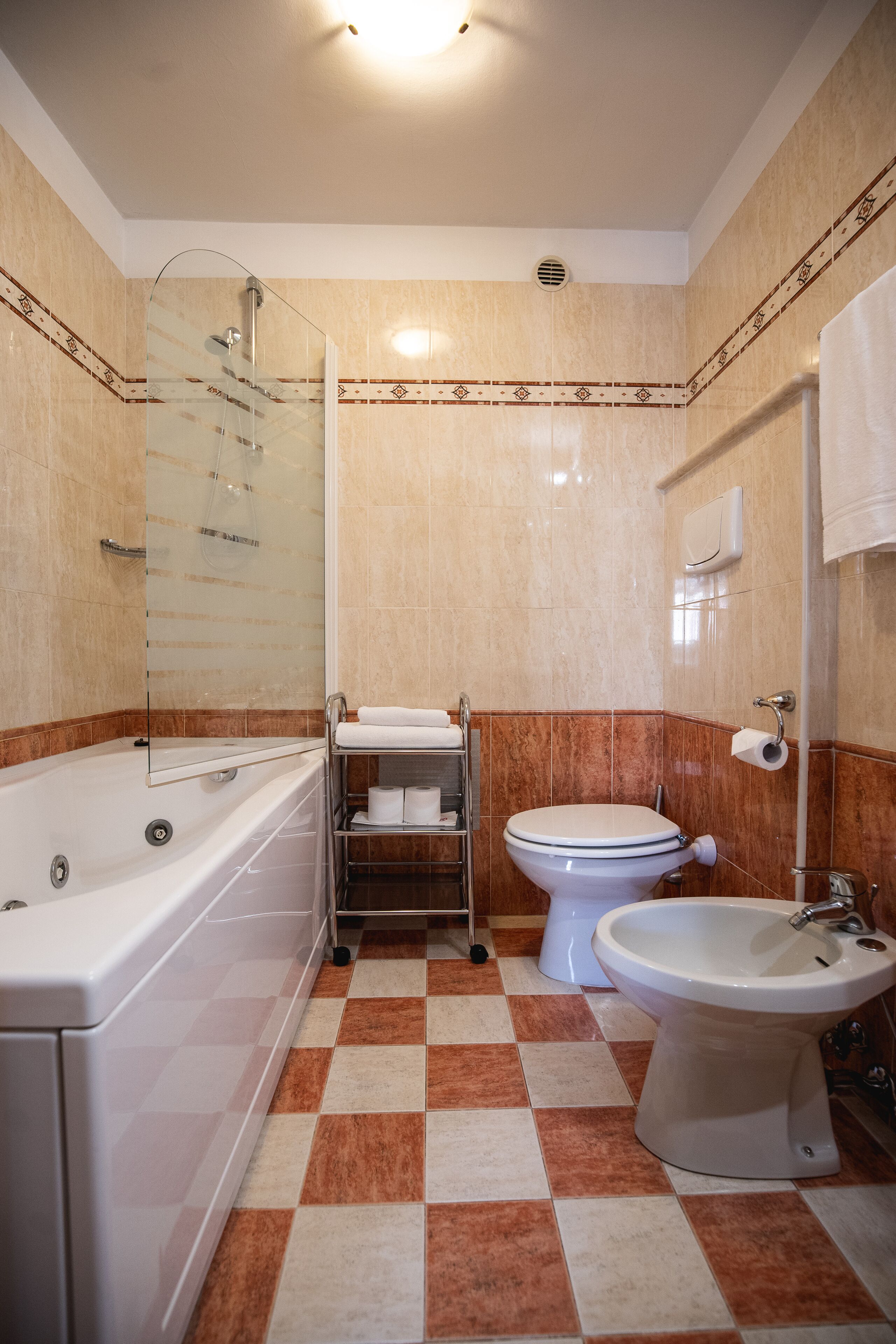 triple room | bathroom | rainfall showerhead, free toiletries, hair dryer, bidet