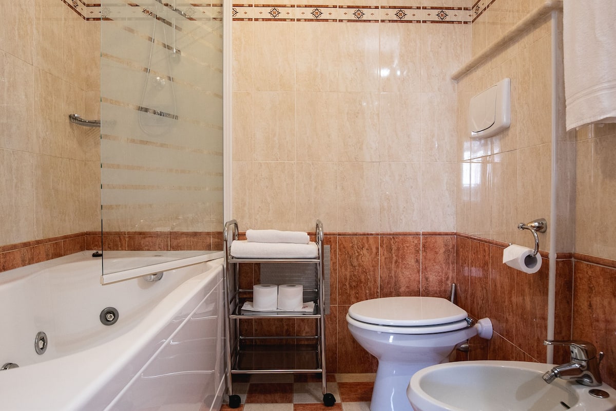 triple room | bathroom | rainfall showerhead, free toiletries, hair dryer, bidet