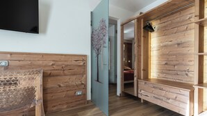 Quadruple Room | Living area - Touring (Predazzo)