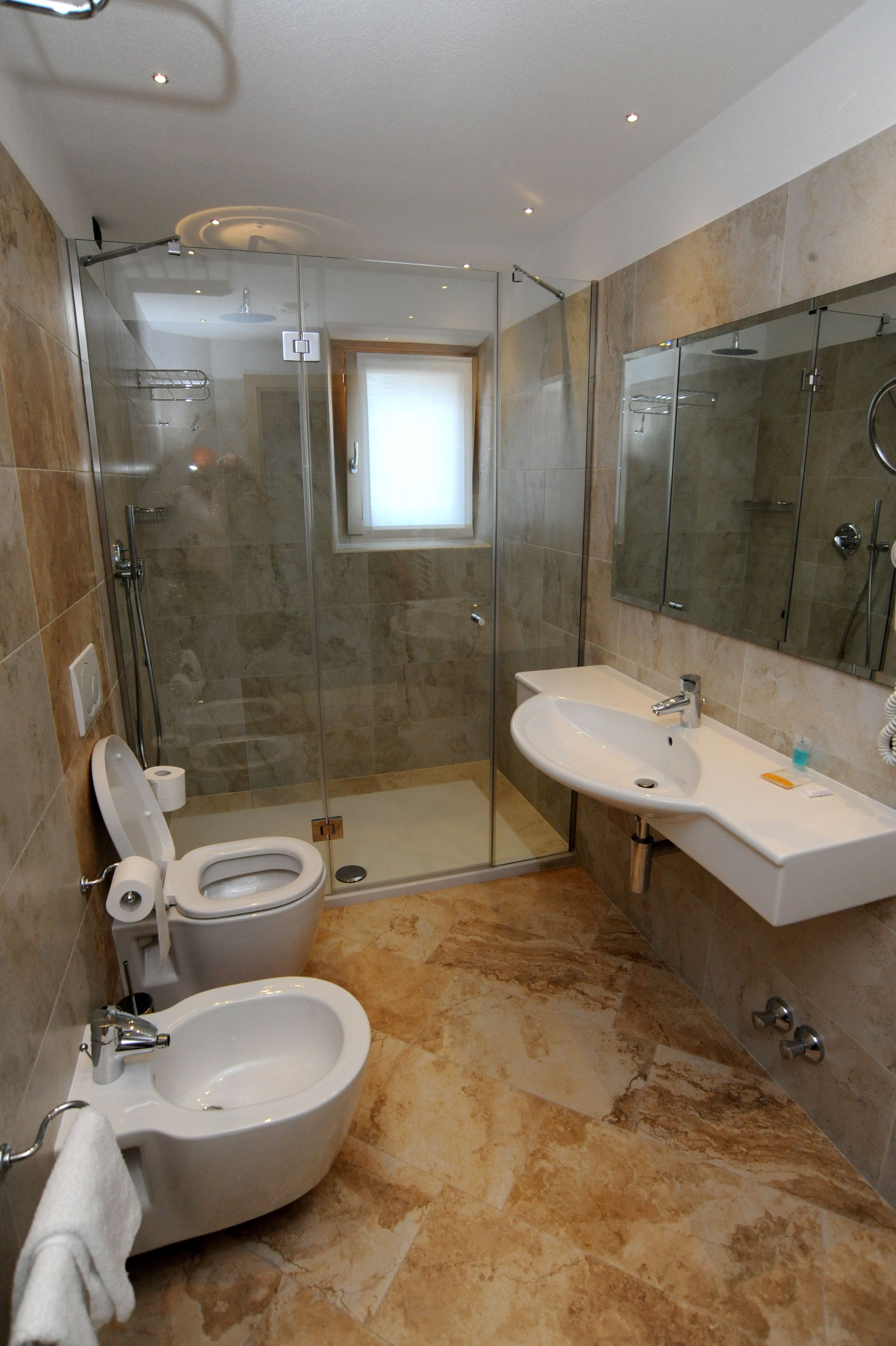 superior room | bathroom | shower, rainfall showerhead, hair dryer, bidet