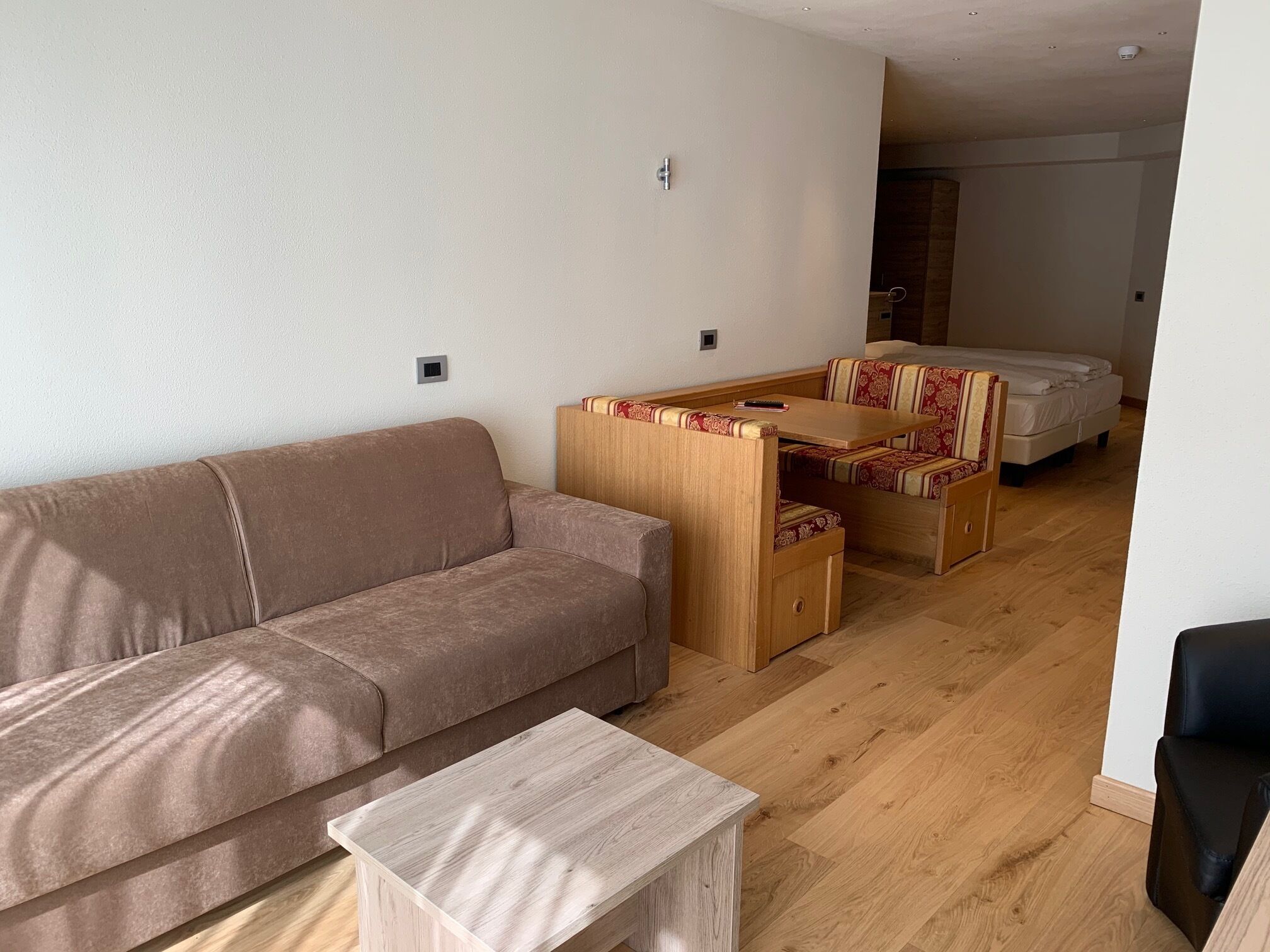 family room | in-room safe, desk, blackout curtains, soundproofing