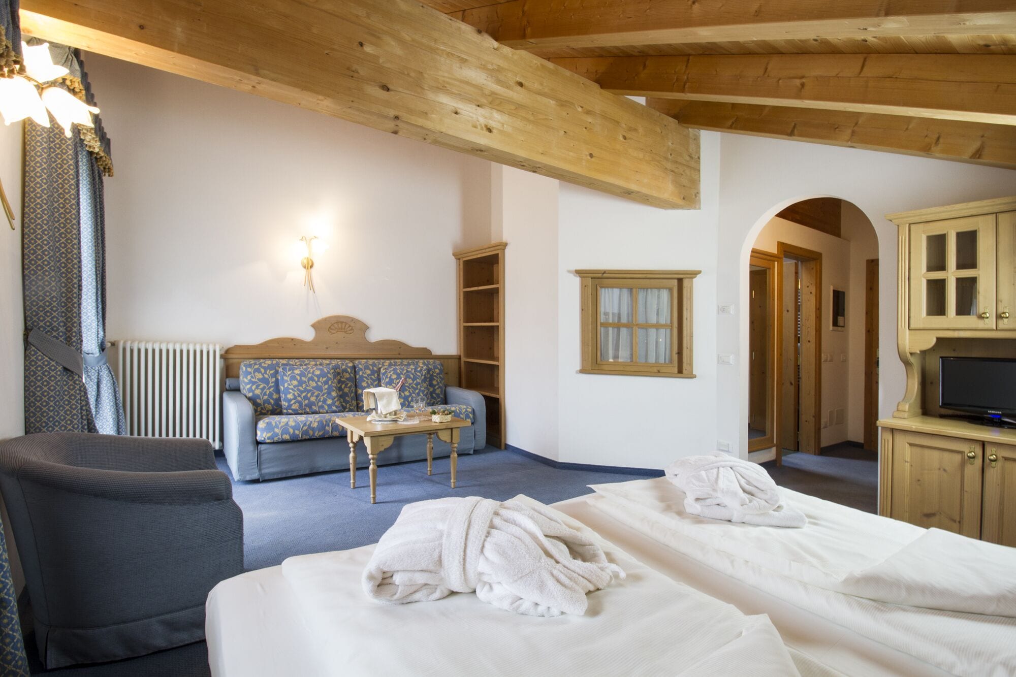 family room | 1 bedroom, down duvets, minibar, in-room safe