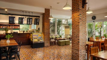 Breakfast, lunch, dinner served; international cuisine, pool views