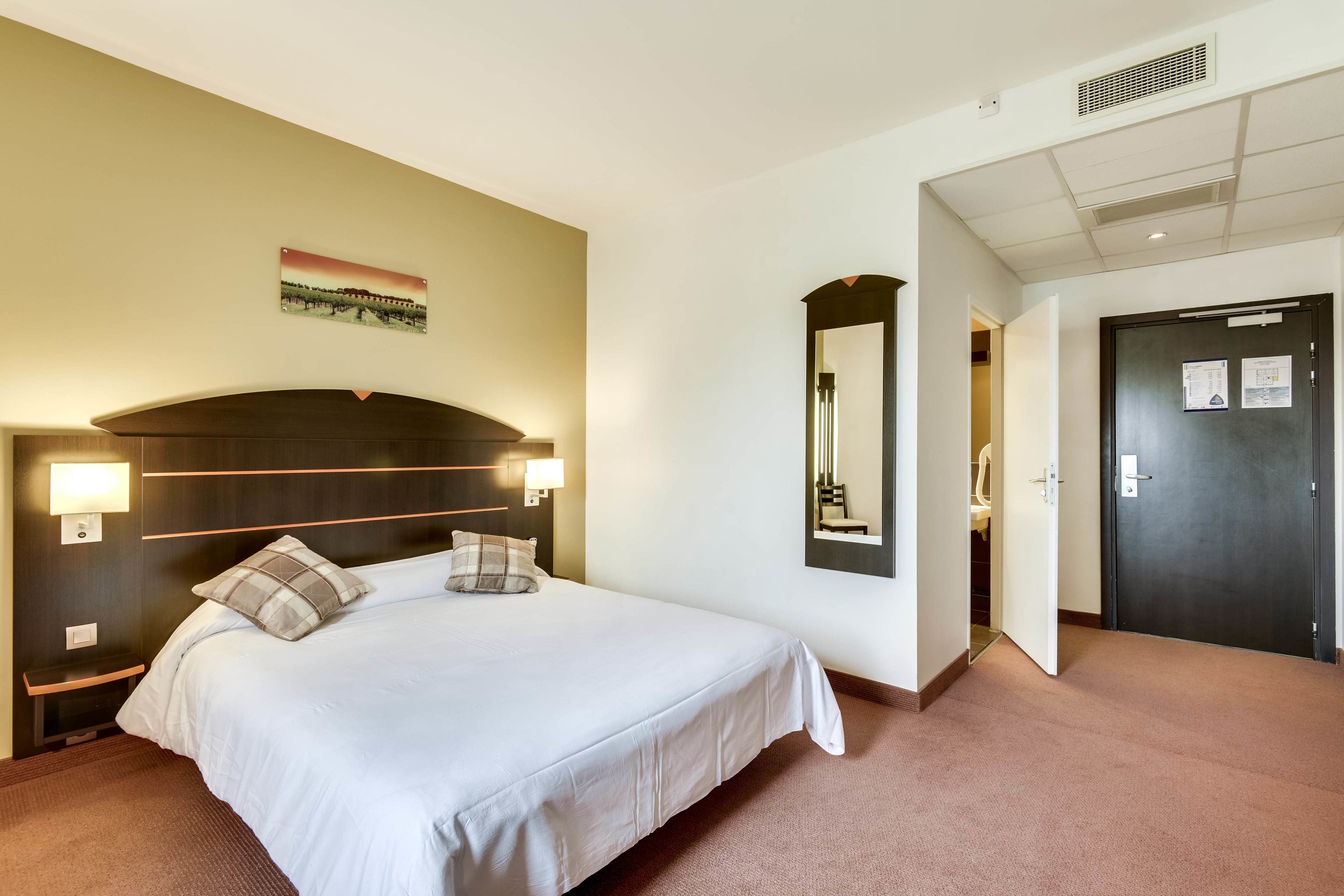 individually decorated, individually furnished, desk, blackout curtains