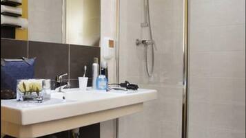 Shower, free toiletries, hair dryer, towels