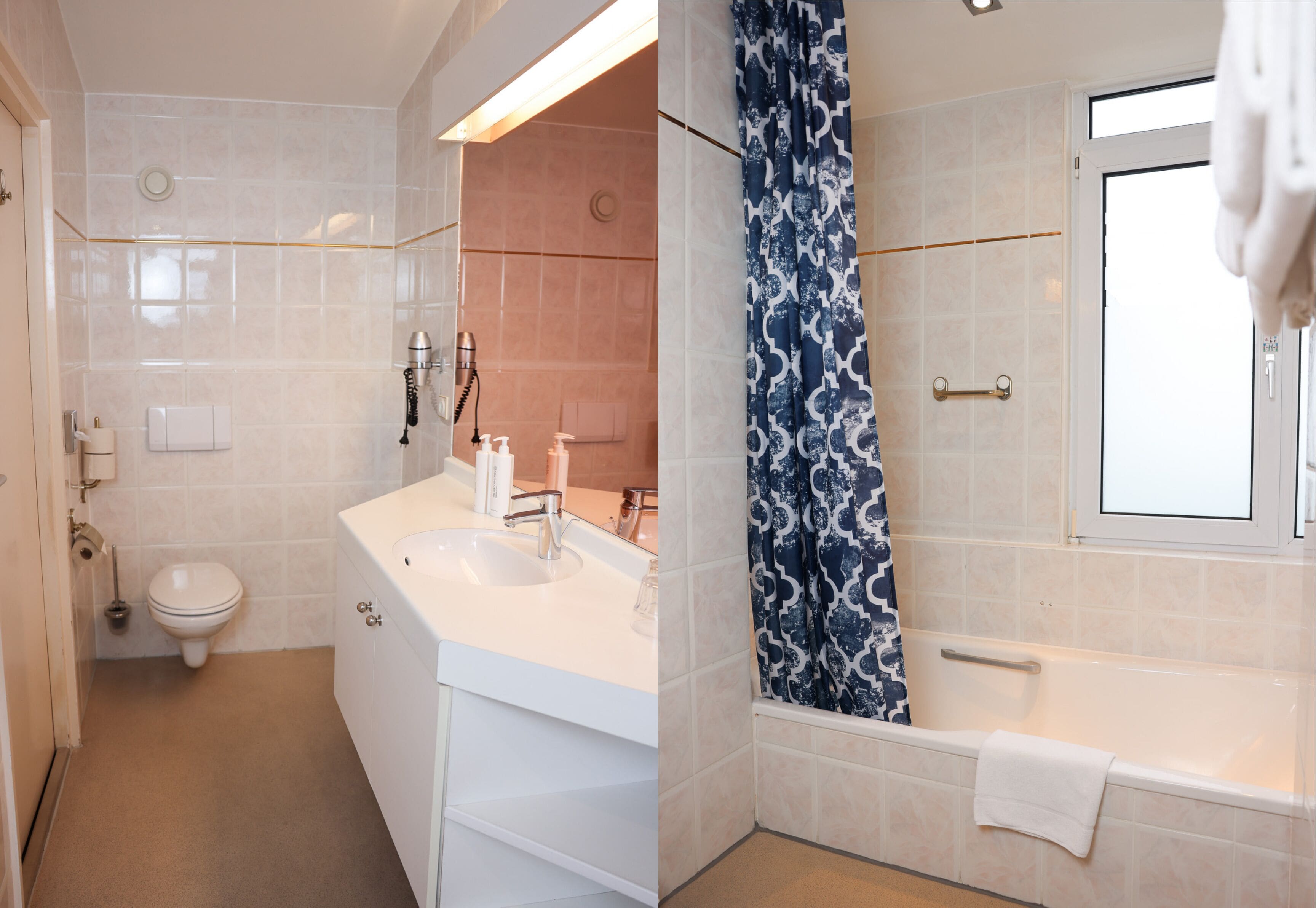 Een moderne badkamer met toilet, wastafel en bad.