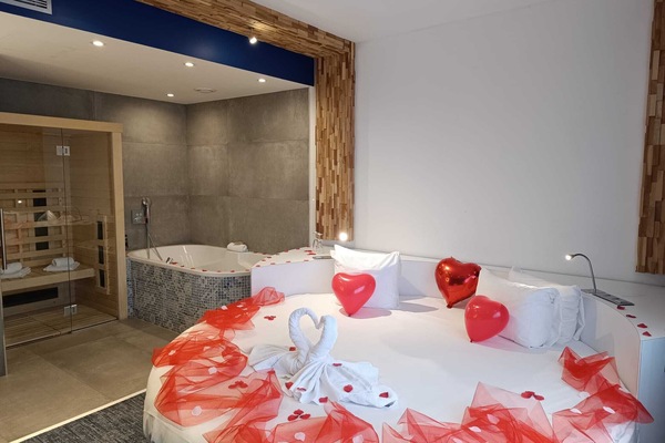 Suite, Multiple Beds | Bathroom | Eco-friendly toiletries, hair dryer, towels, soap