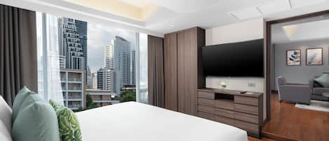 Suite, 1 très grand lit | Lit avec matelas Select Comfort, coffre-fort, rideaux d’obscurcissement