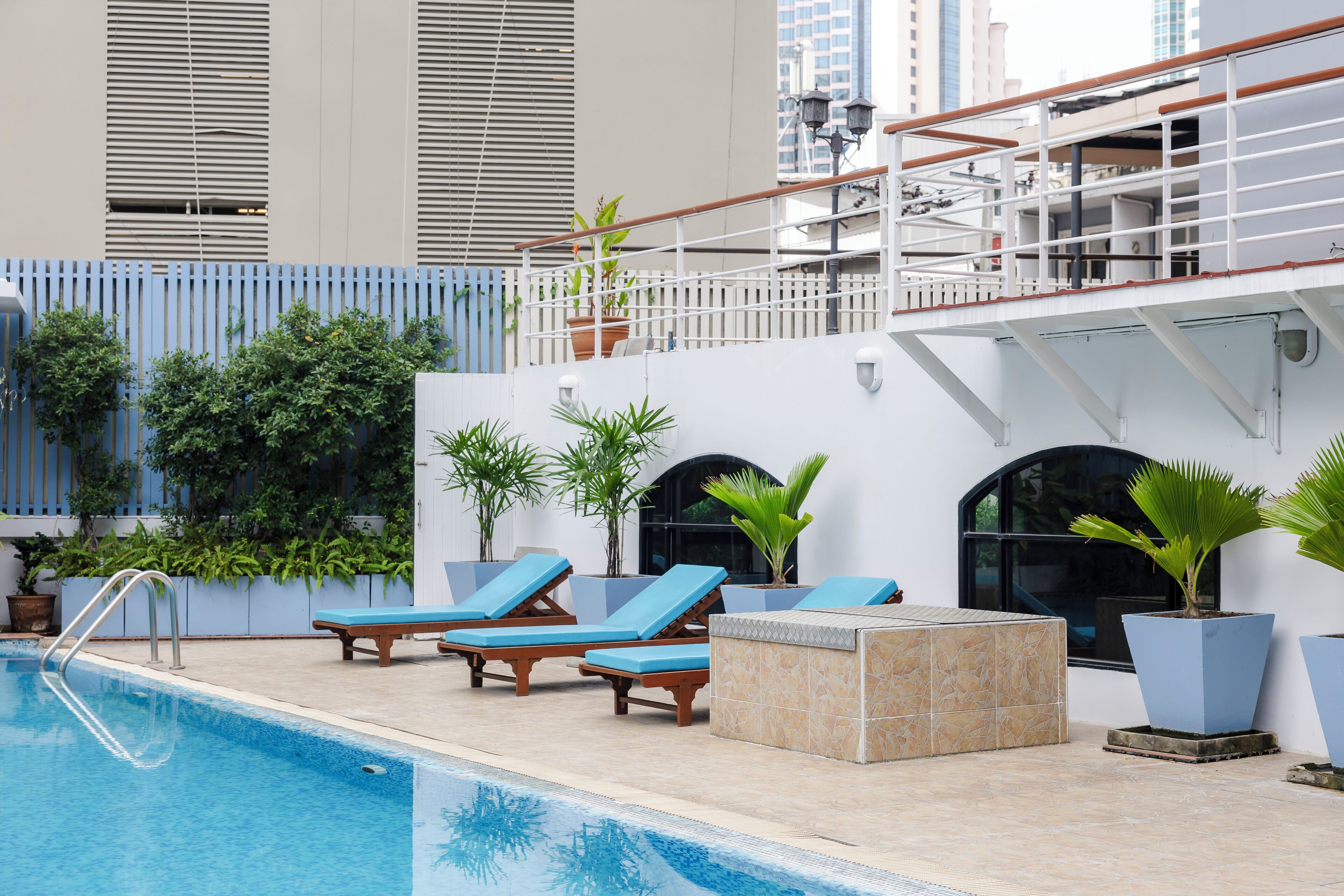 Outdoor pool, open 7:00 AM to 8:00 PM, pool umbrellas, pool loungers