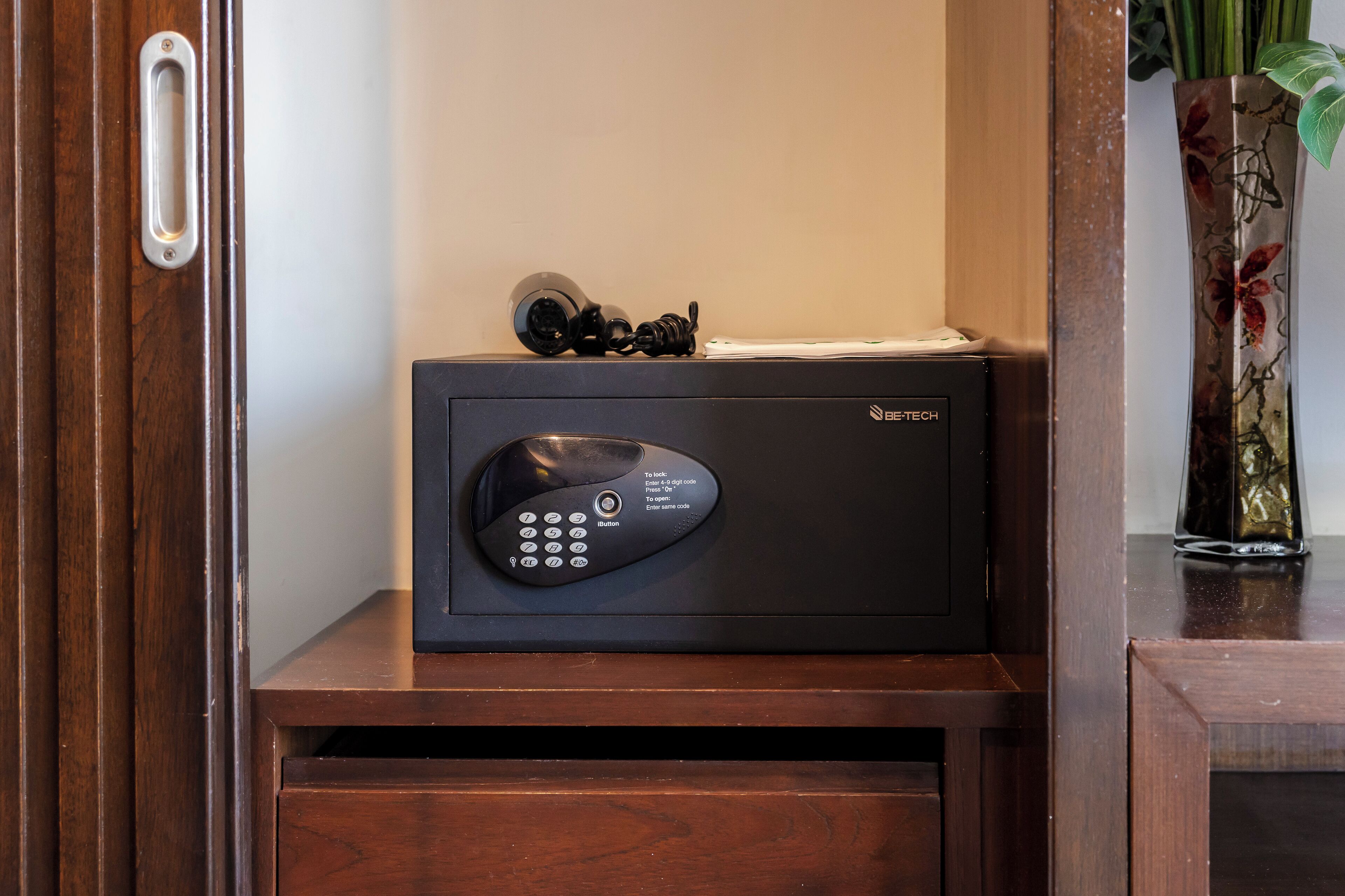 A black electronic device with a keypad and a label that reads "BBTECH."