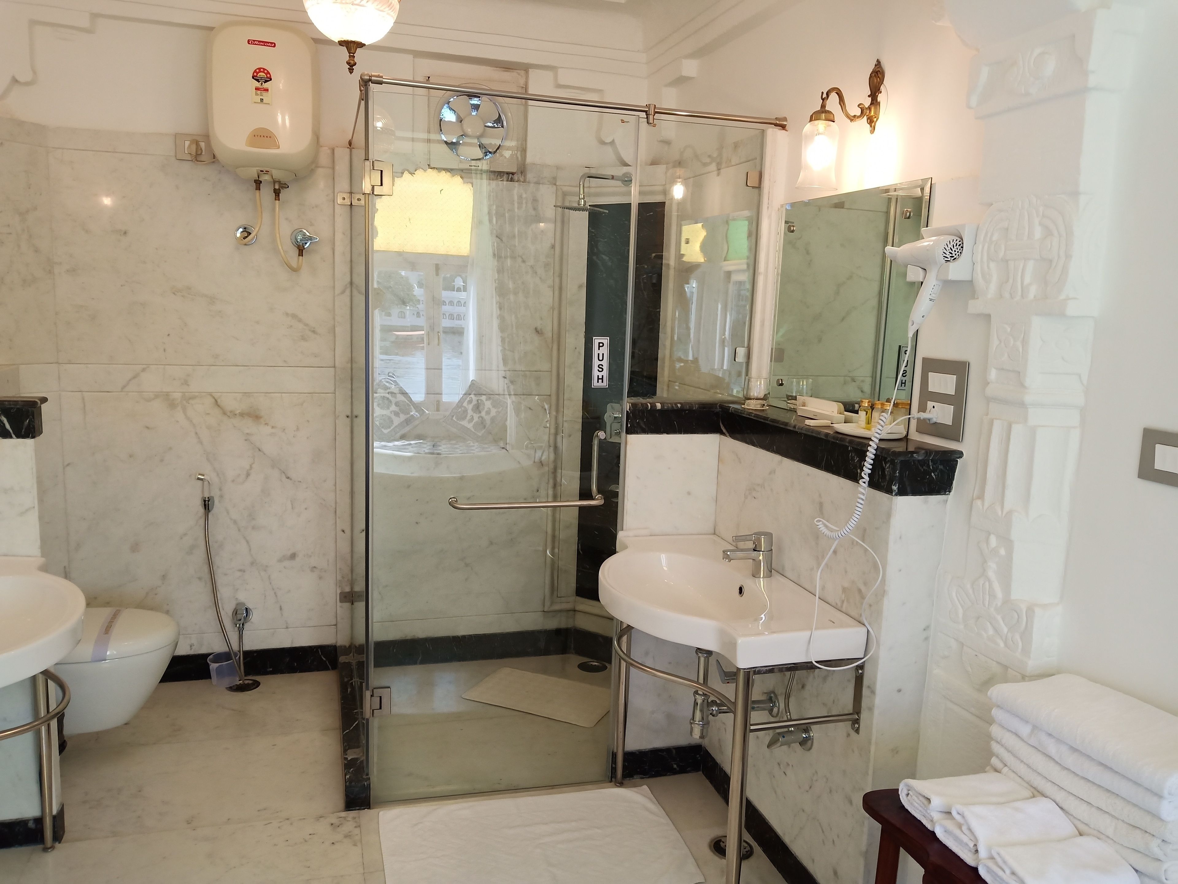 jagat suite lake facing | bathroom | shower, rainfall showerhead, free toiletries, hair dryer