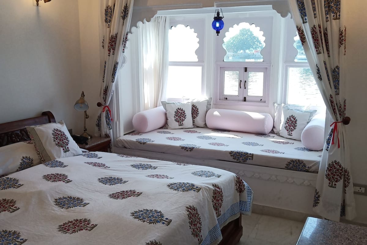 heritage lake facing room | in-room safe, rollaway beds, free wifi, bed sheets