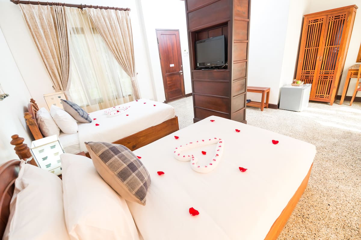 Quarto casal ou duplo superior, vista para o jardim | Frigobar, cofres nos quartos, Wi-Fi de cortesia