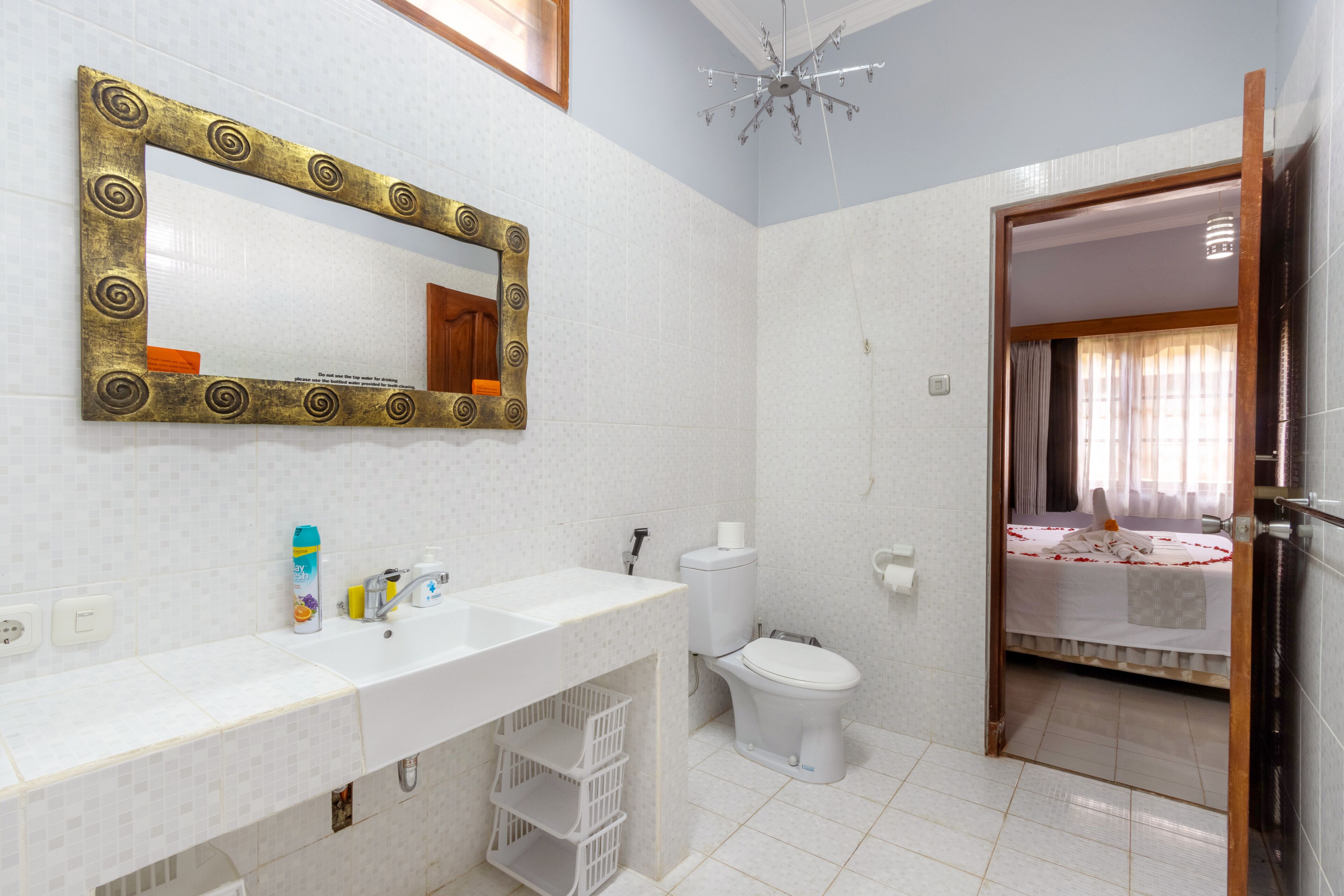 bungalow with king bed | bathroom | shower, hair dryer, towels
