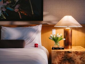 Premium bedding, down comforters, minibar, in-room safe