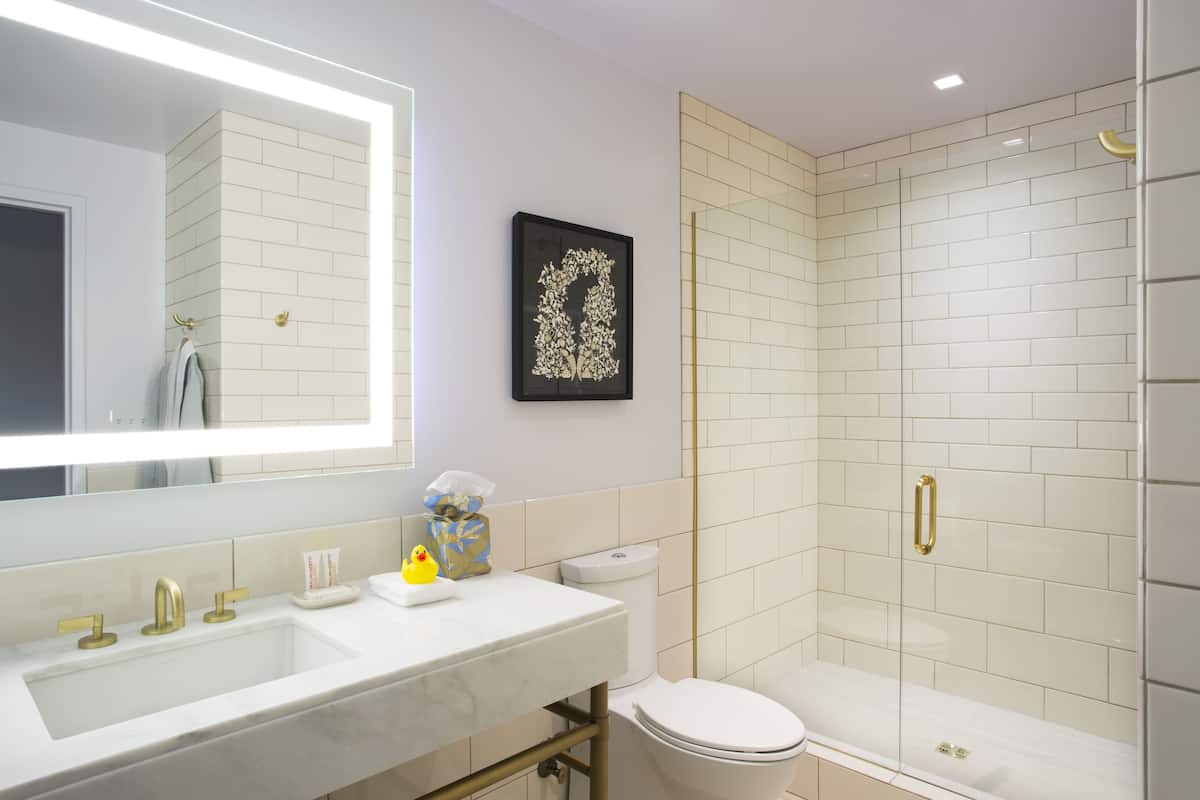 eco-friendly toiletries, hair dryer, towels