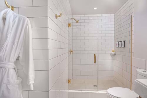 Premium bedding, down comforters, minibar, in-room safe