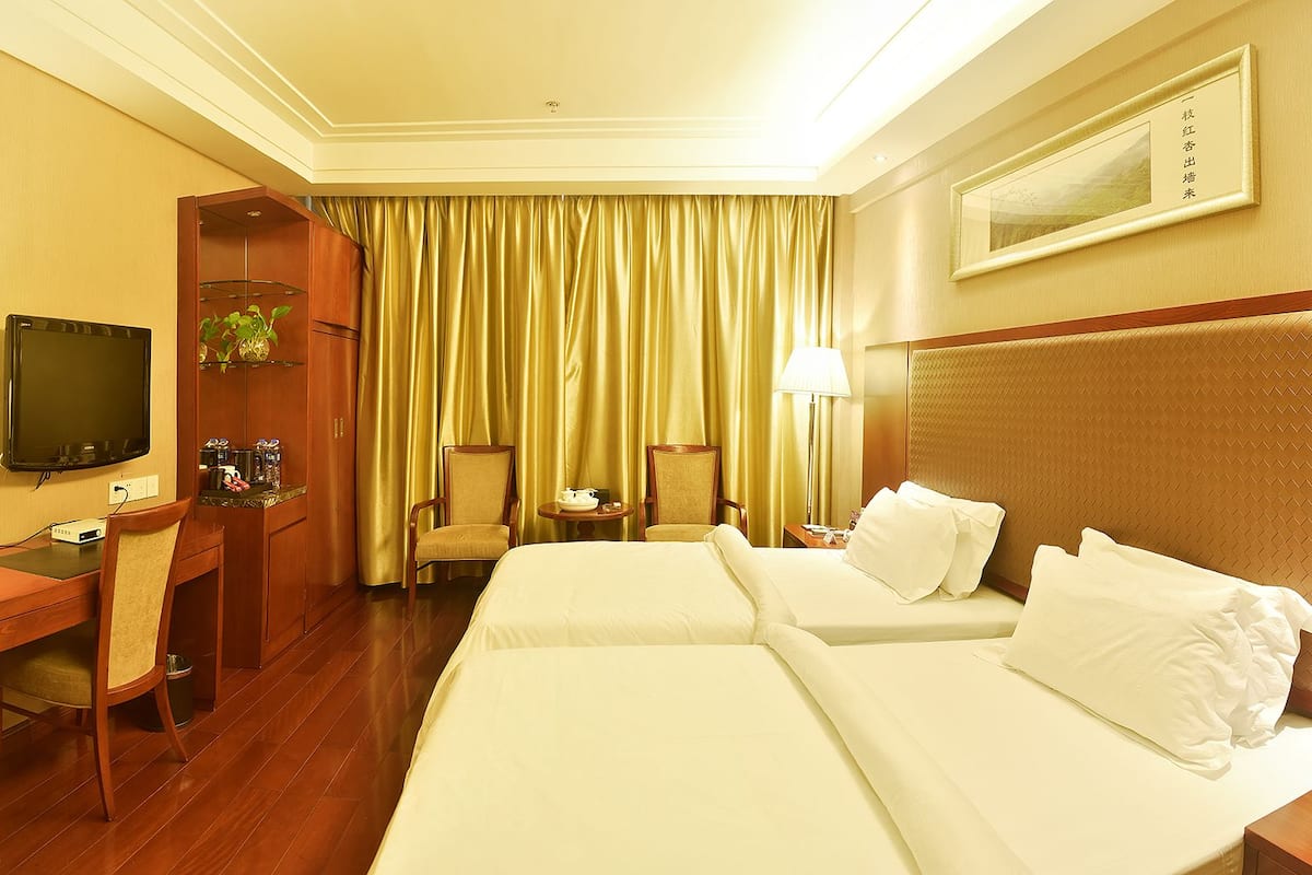 Twin Room (Extreme Sassy) | Premium bedding, desk, blackout drapes, iron/ironing board