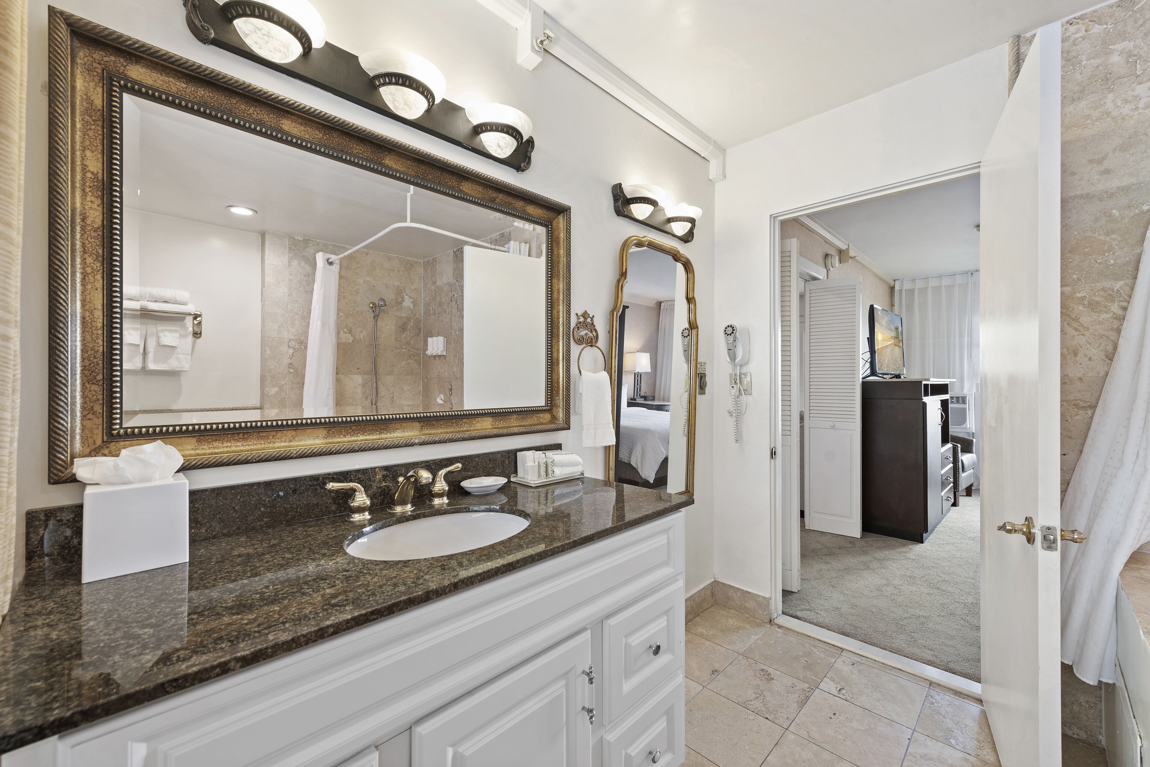 standard suite, 1 king bed with sofa bed | bathroom | free toiletries, hair dryer, towels, soap