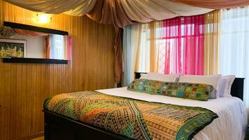 Premium bedding, down duvets, blackout curtains, free WiFi