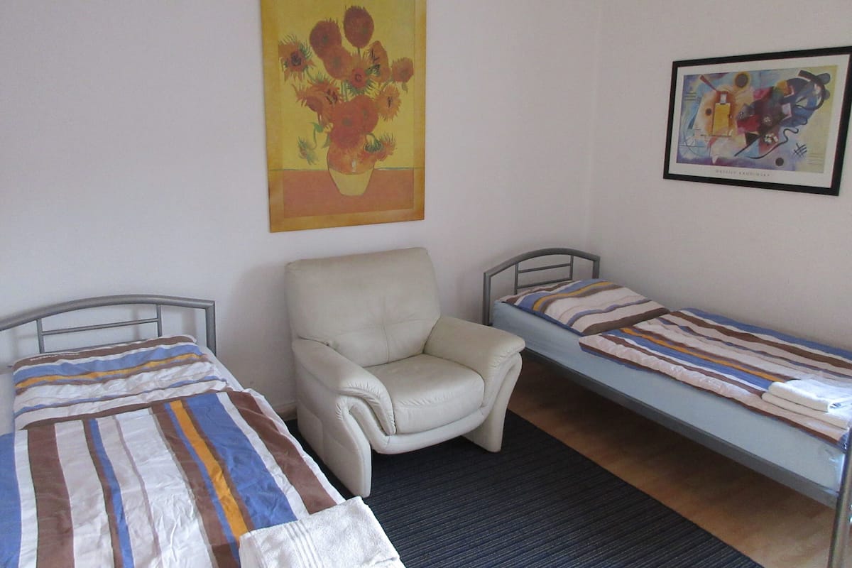 Family Twin Room, Shared Bathroom | Iron/ironing board, free WiFi, bed sheets
