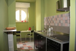 Fridge, stovetop, coffee/tea maker, cookware/dishes/utensils