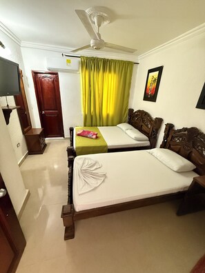 Triple Room | Iron/ironing board, free WiFi
