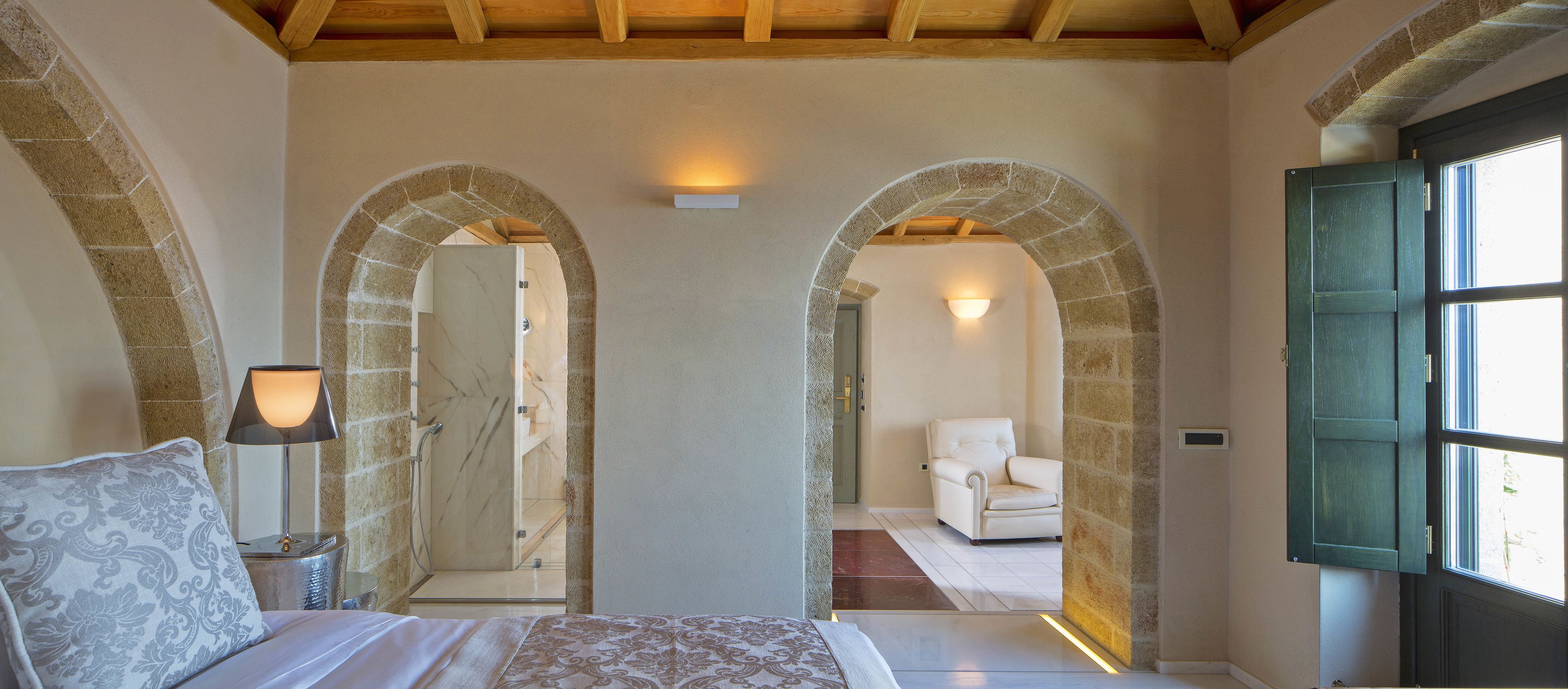 deluxe suite, balcony, sea view | living area | flat-screen tv, fireplace