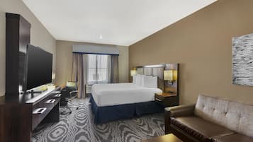 Suite, 1 King Bed, Non Smoking, Refrigerator & Microwave (with Single Sofabed) | Desk, laptop workspace, blackout drapes, soundproofing