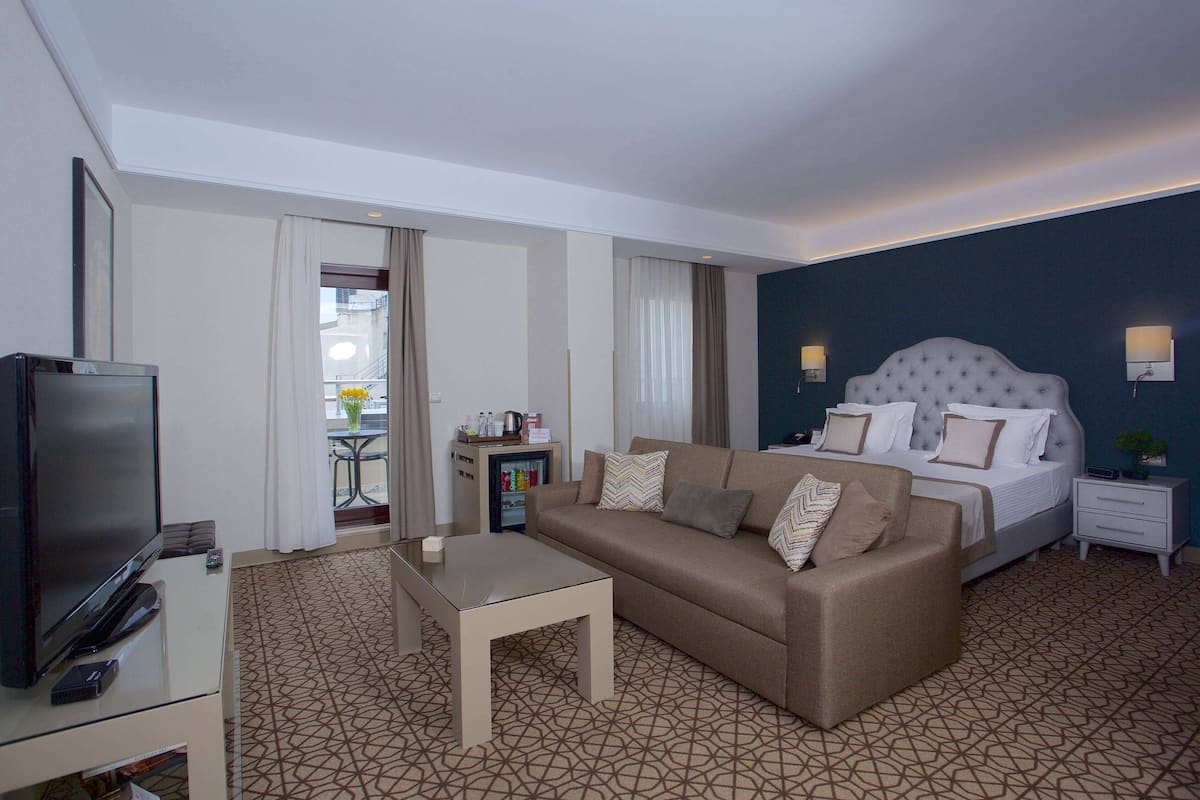 Suite, 1 letto king | 1 camera, biancheria da letto di alta qualità, minibar