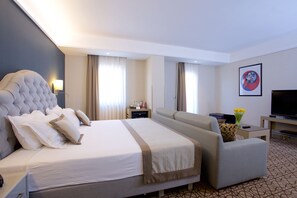 Suite, 1 King Bed | Premium bedding, minibar, in-room safe, desk