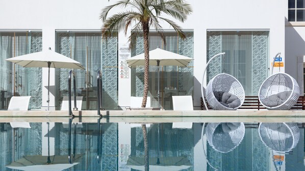 Indoor pool, outdoor pool, open open 24 hours a day, pool umbrellas