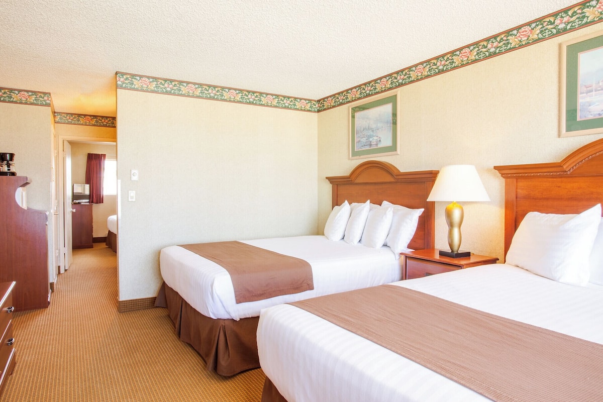 Two Queen Ground Level w/ Kitchenette | 1 bedroom, blackout drapes, free WiFi, bed sheets