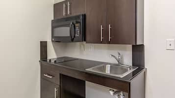 Fridge, microwave, stovetop, cookware/dishes/utensils