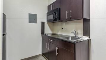 Fridge, microwave, stovetop, cookware/dishes/utensils