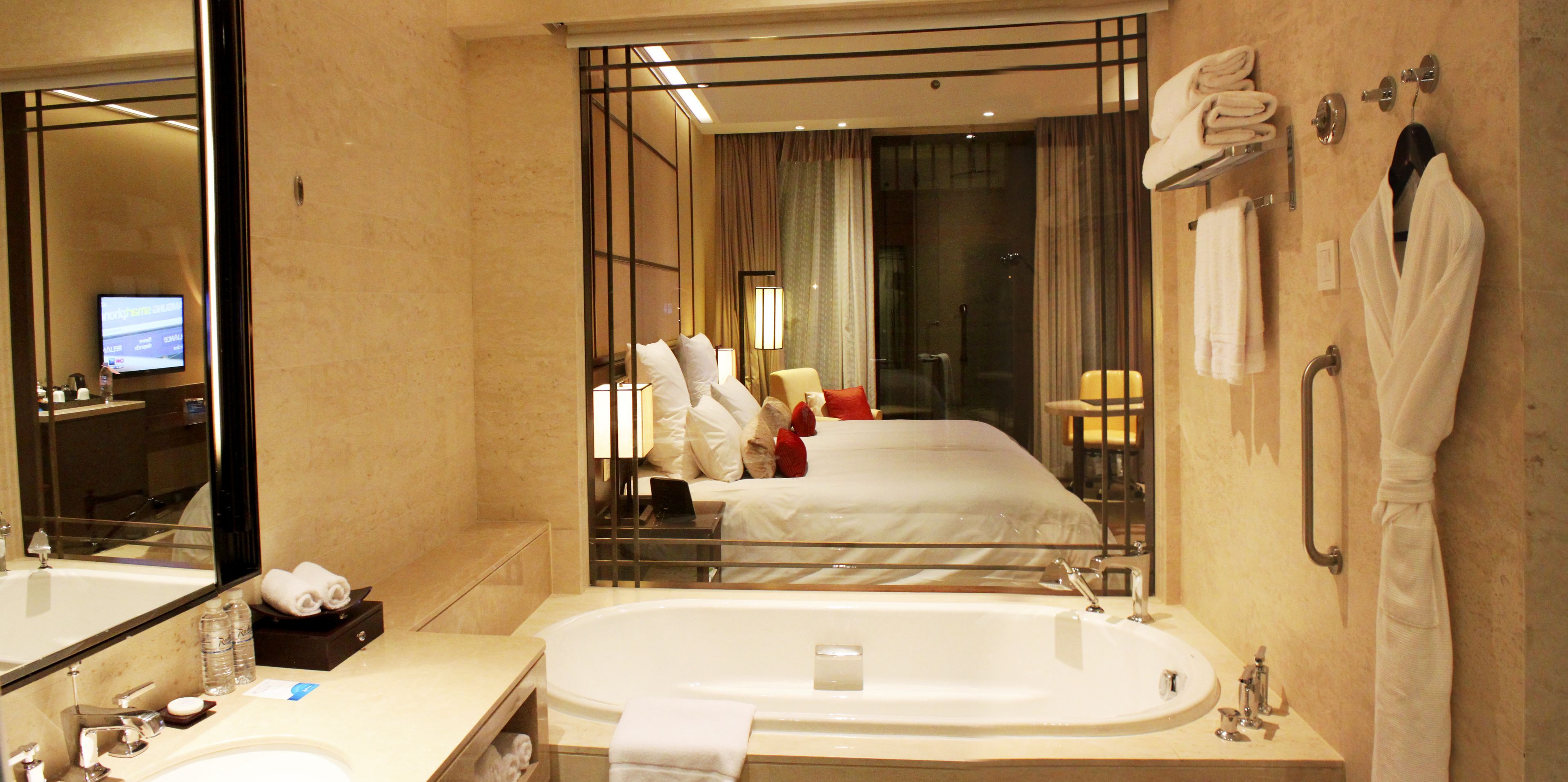 rainfall showerhead, designer toiletries, hair dryer, bathrobes