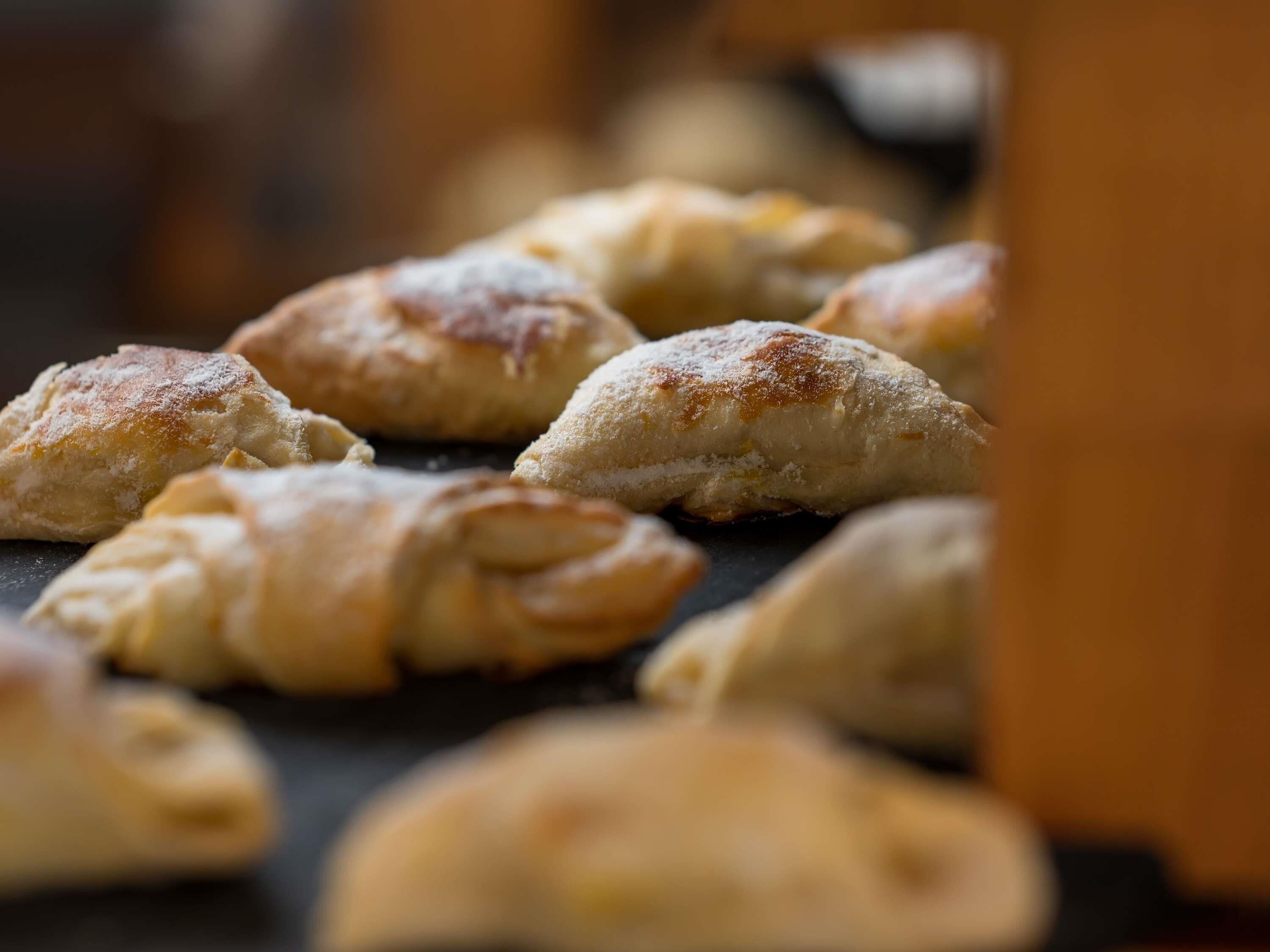 A close-up of pastries on a tray.